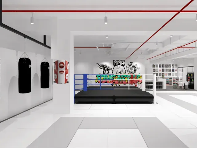 Fitness studio with white floor, ring and equipment display
